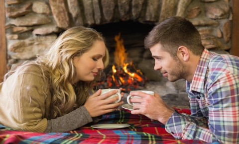 couple enjoying their fire place